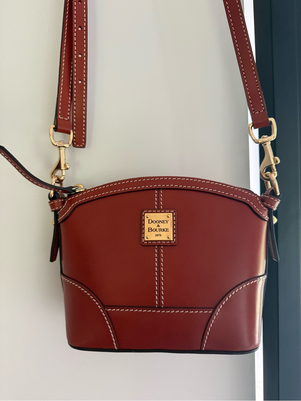 Dooney & Bourke Rust Brown Leather Satchel with Gold Plaque